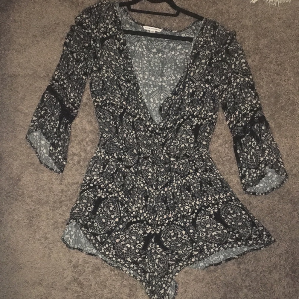 Black patterned long-sleeve romper